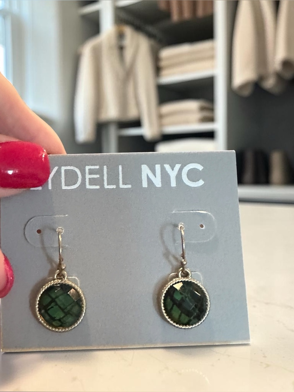 Lydell NYC faceted round drop earrings featuring emerald-green stone look insert